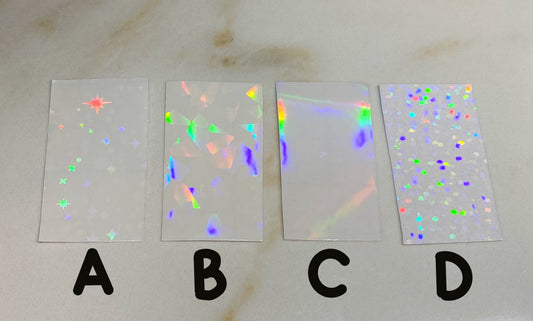 Four holographic paper samples labled A, B, C, and D.