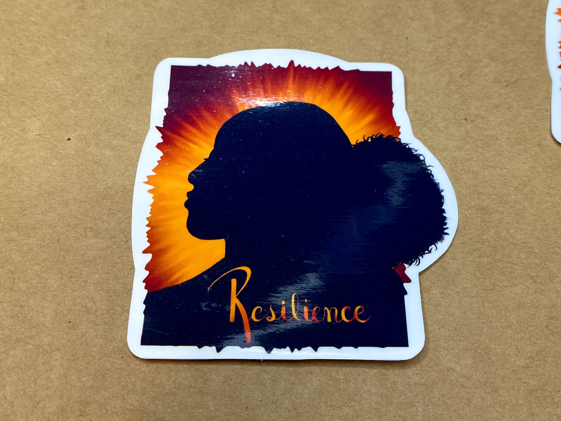 Resilience sticker with glossy finish.